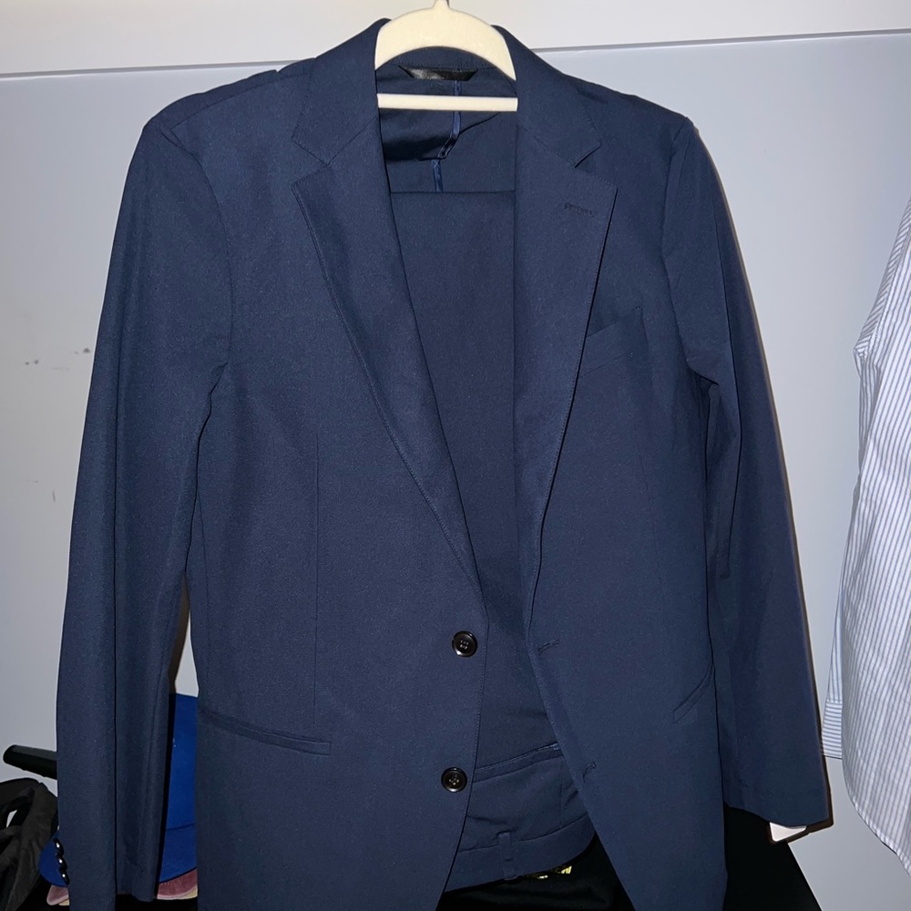 Brand new Soho Flextech Navy Suit ($599 Retail)